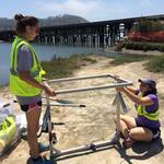 Angelica and Maddie set up the frame for an August instrument check